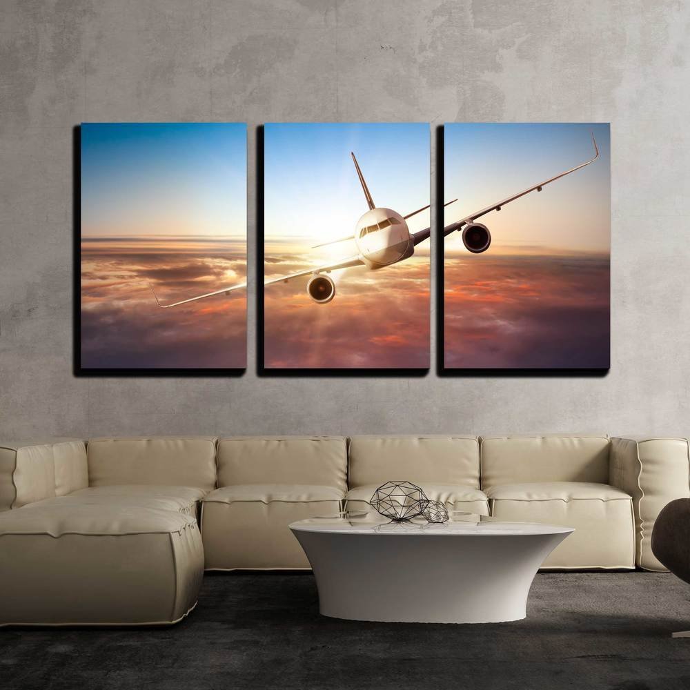Canvas Wall Art - Commercial Airplane Flying above Clouds in Dramatic Sunset Light Drop shipping